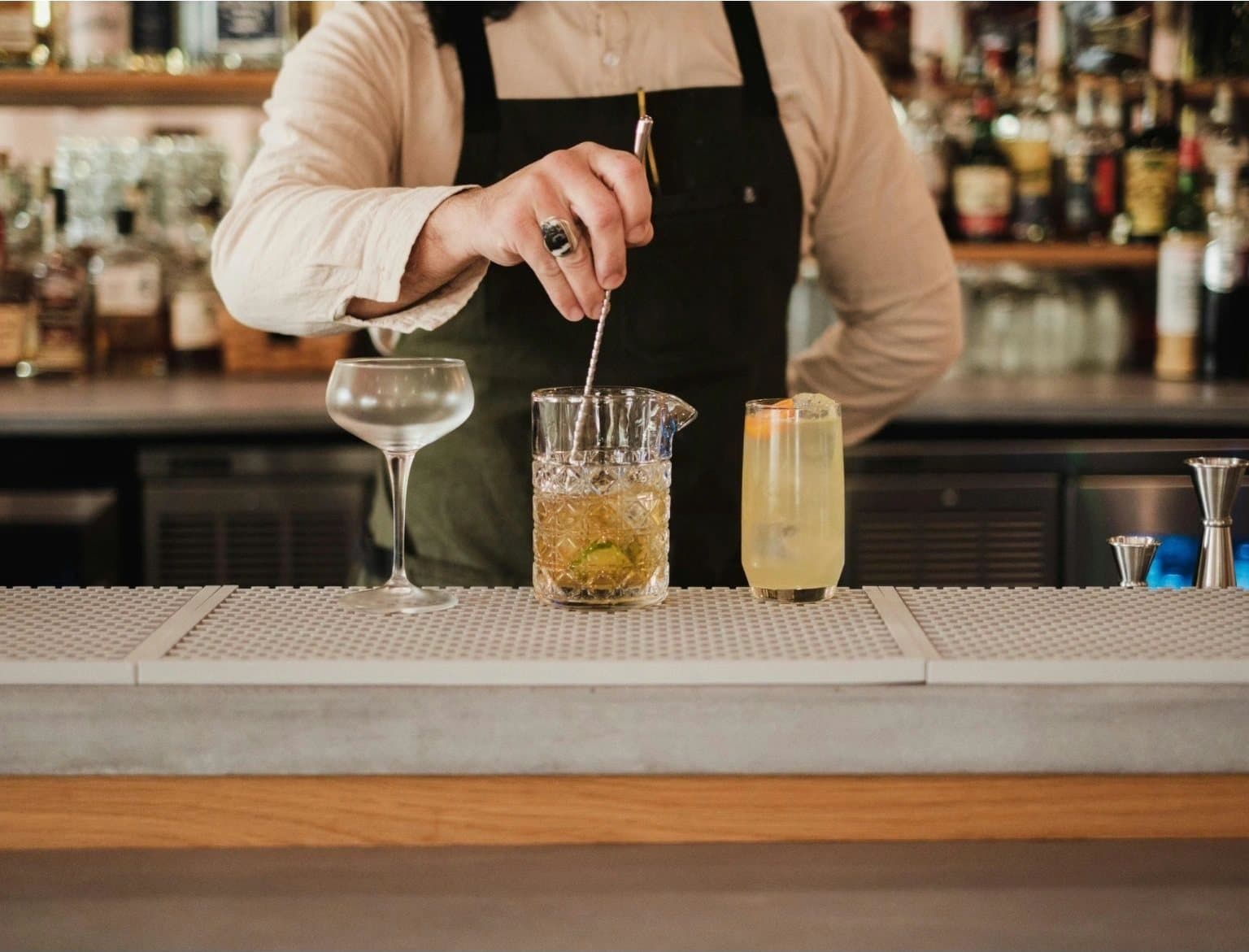 Bartender preparing a Tibra cocktail